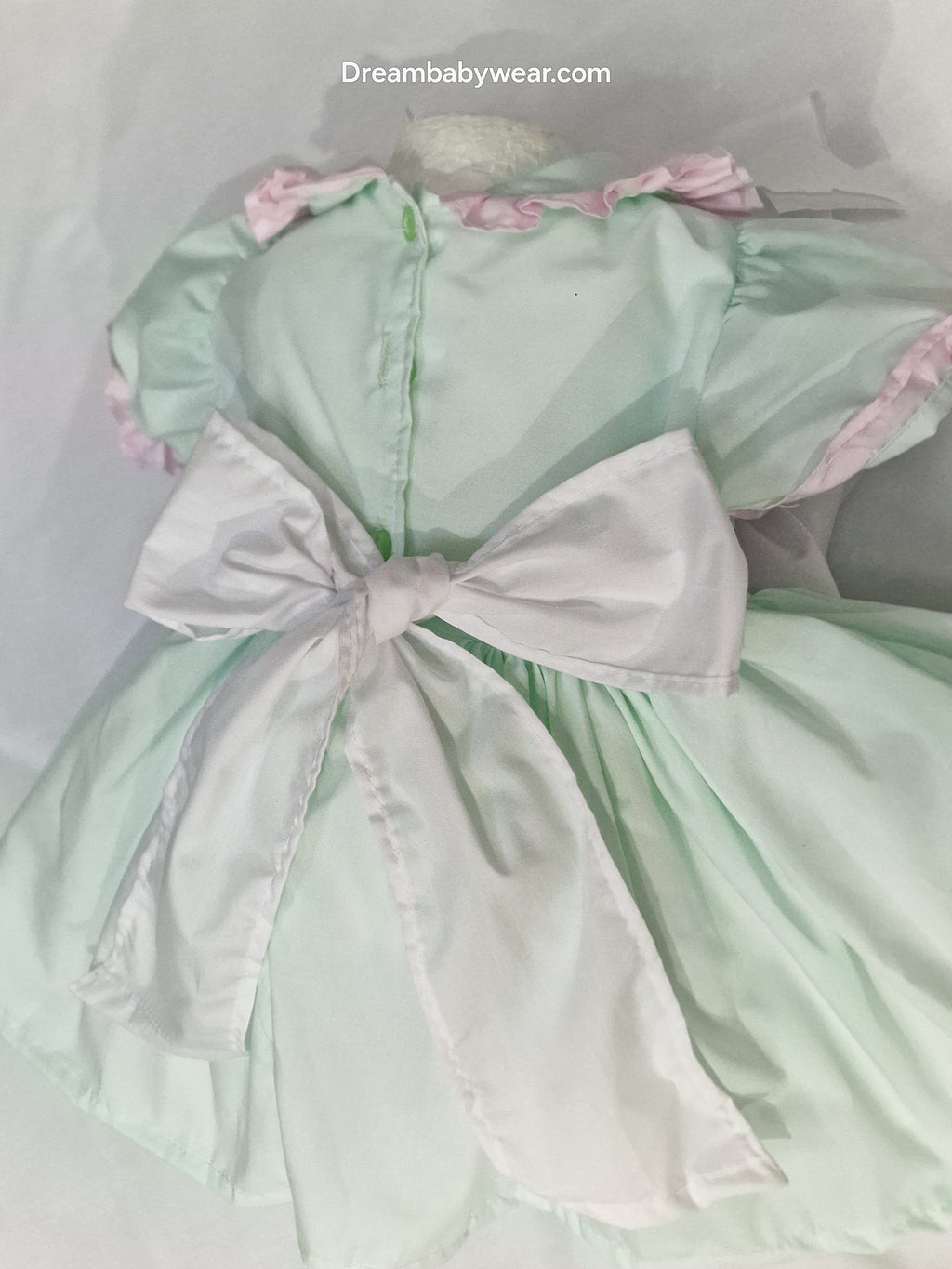 Nova mint pink faux smocked teddy embroidered panel  lined dress