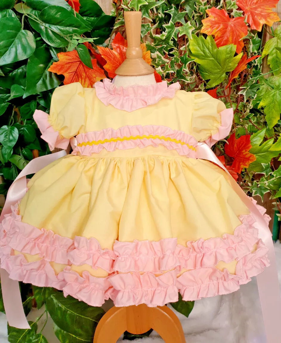 April lemon and pink ruffles twirly lined dress 0-7 years